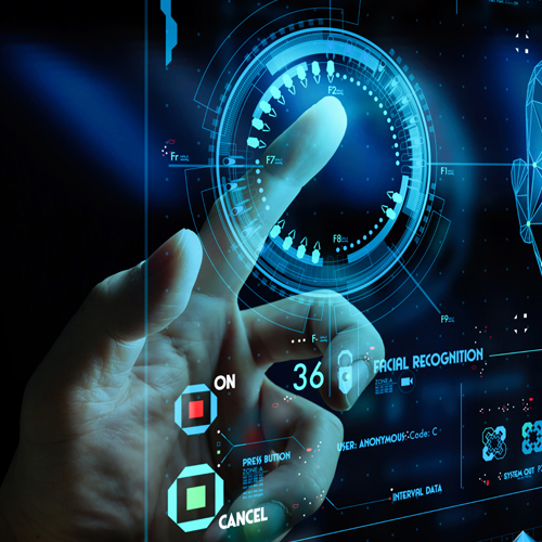 Eine Person berührt mit der Hand eine virtuelle Benutzeroberfläche.