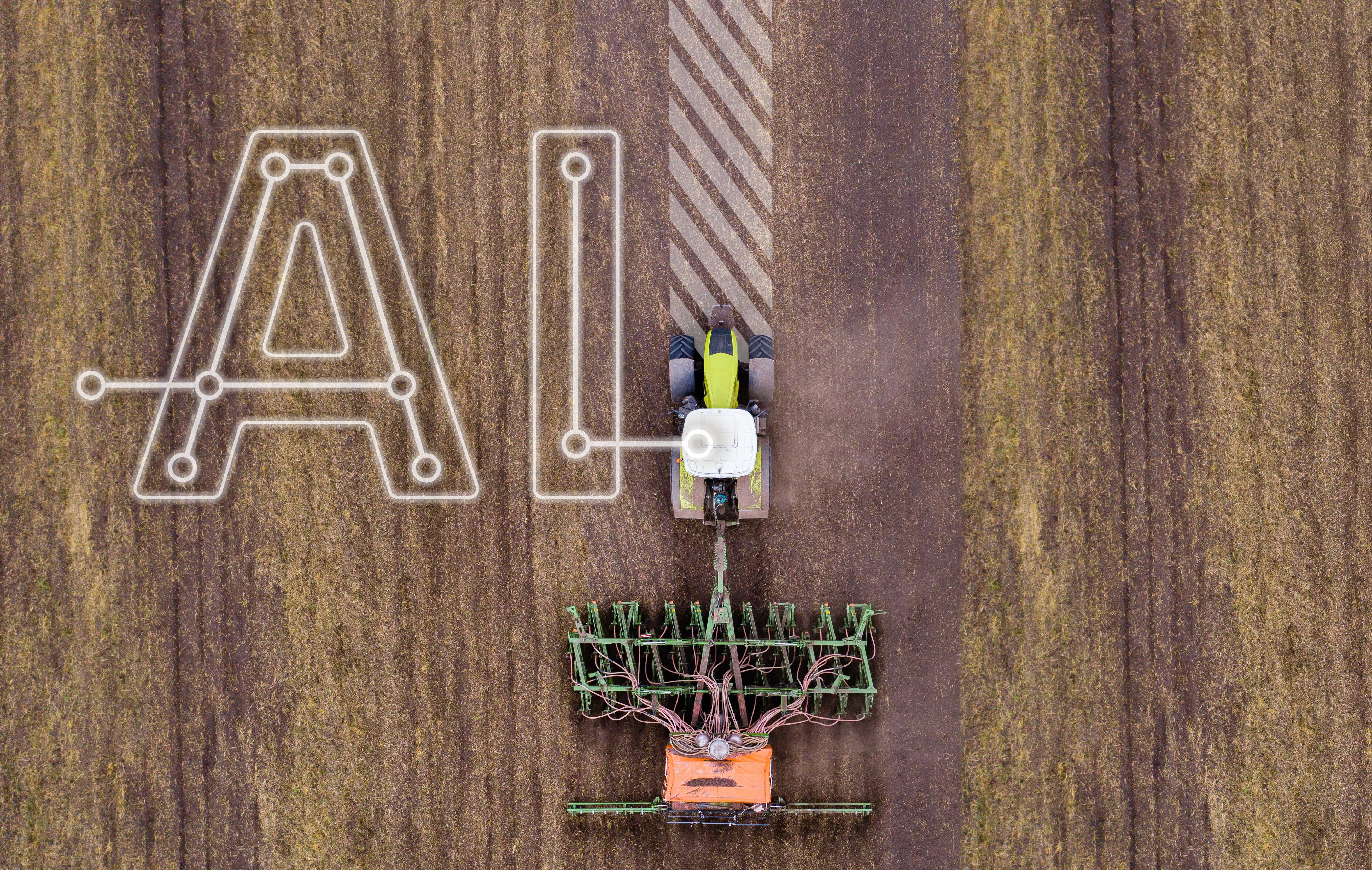Ein Traktor fährt über ein Feld