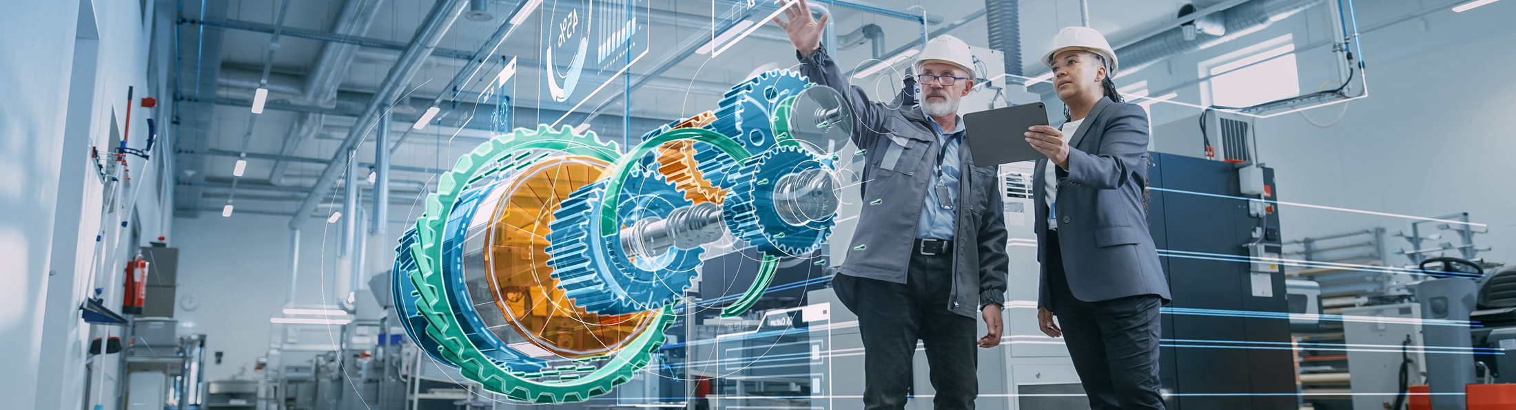 Ein Mann und eine Frau betrachten eine in einem Hologramm dargestellte Maschine