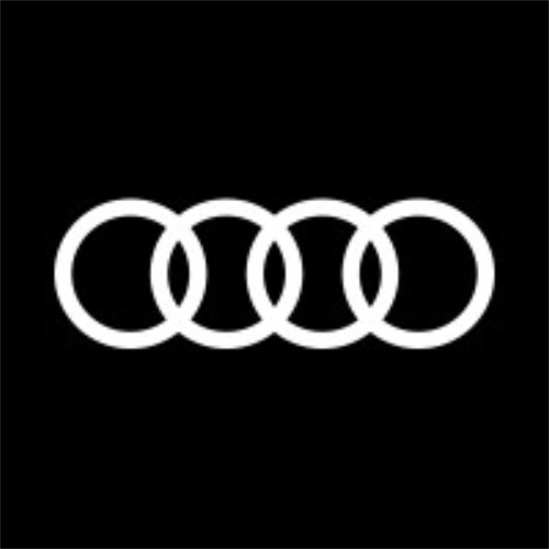 Logo der Audi AG, welches 4 überlappende weiße Kreise auf schwarzen Hintergrund zeigt