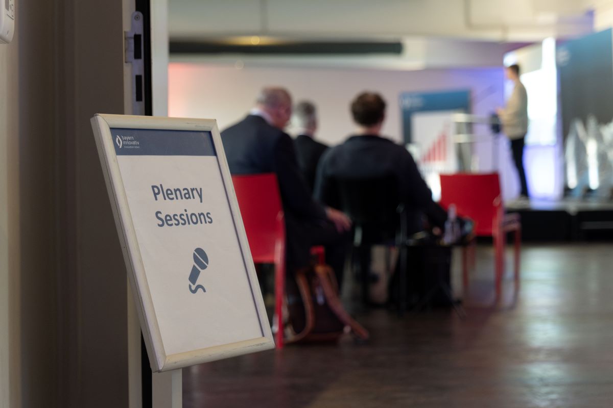 The entrance to the Thinknet 6G Summit stage, showing a sign with "Plenary Sessions" on it.