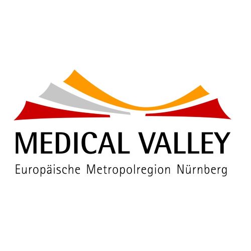 Medical Valley Logo, showing the written name below 3 collored lines that fomr a bow.
