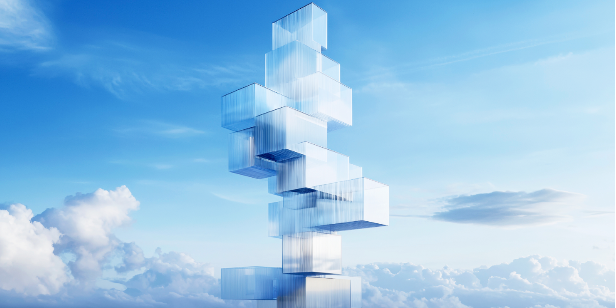 Das Bild zeigt ein hohes Gebäude aus Glasbausteinen vor einem blauen Himmel mit weißen Wolken.