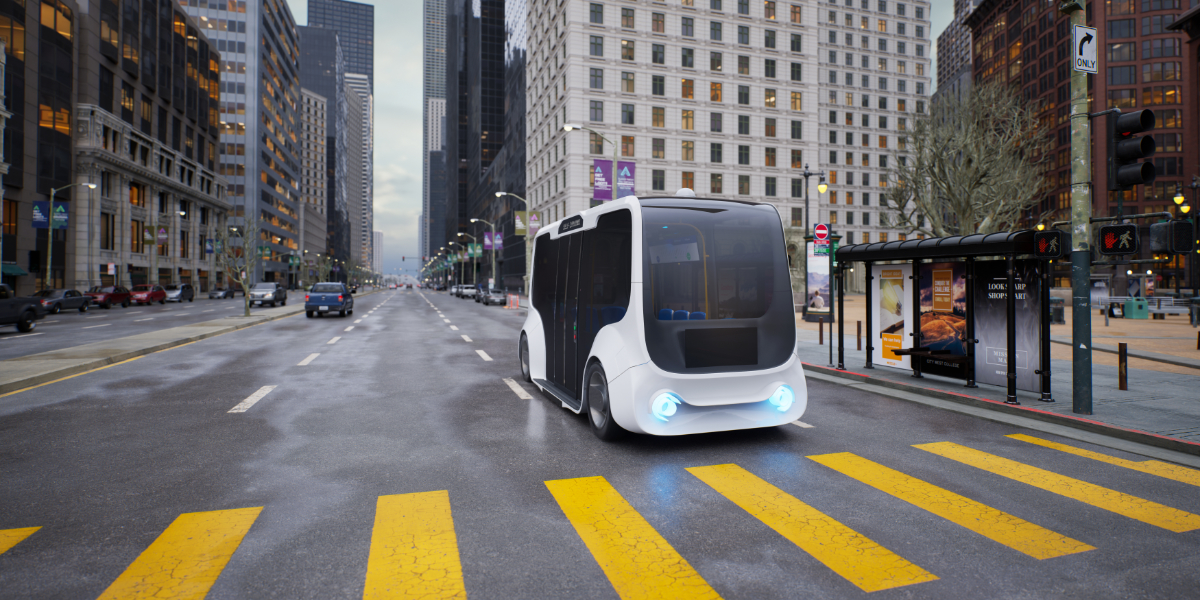 Autonomes Shuttle-Fahrzeug in moderner Großstadtumgebung auf nasser Straße.