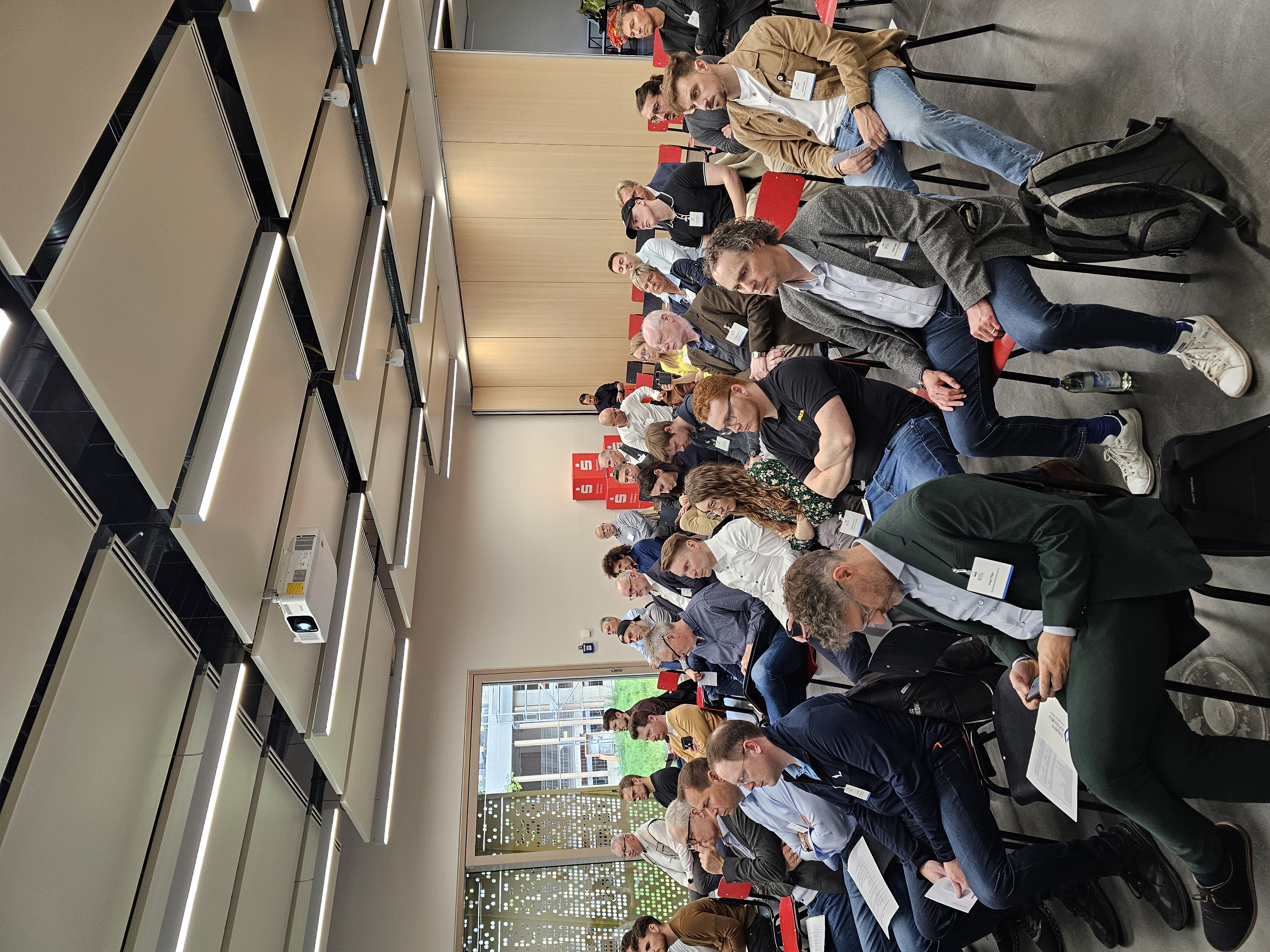 Zuhörer eines Vortrags auf dem Cluster-Treff Wärme 4.0 auf dem Lagarde Campus Bamberg