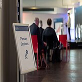 The entrance to the Thinknet 6G Summit stage, showing a sign with "Plenary Sessions" on it.