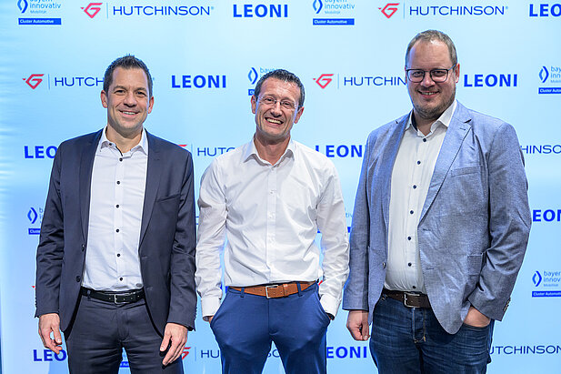 Referenten auf der Bühne beim Kooperationsforum Bordnetze 2025