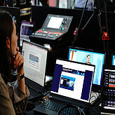 Another look into the directors area with laptops and audio panels
