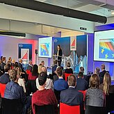 Dr. Alexandra-Gwyn Paetz, speaking on the stage of the Thinknet 6G Summit