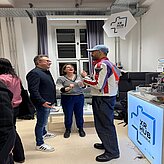 Daniel Nusser, Johanna Lison und Christian Fayek im Austausch