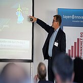 Mr. Köpp presenting on the Thinknet 6G Summit stage