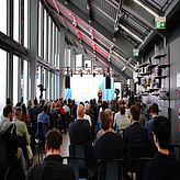 The plenum from the back, watching the presentation
