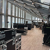 The still empty location with a lot of technical suitcases