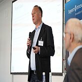 Dr. Schupke presenting on the Thinknet 6G Summit stage