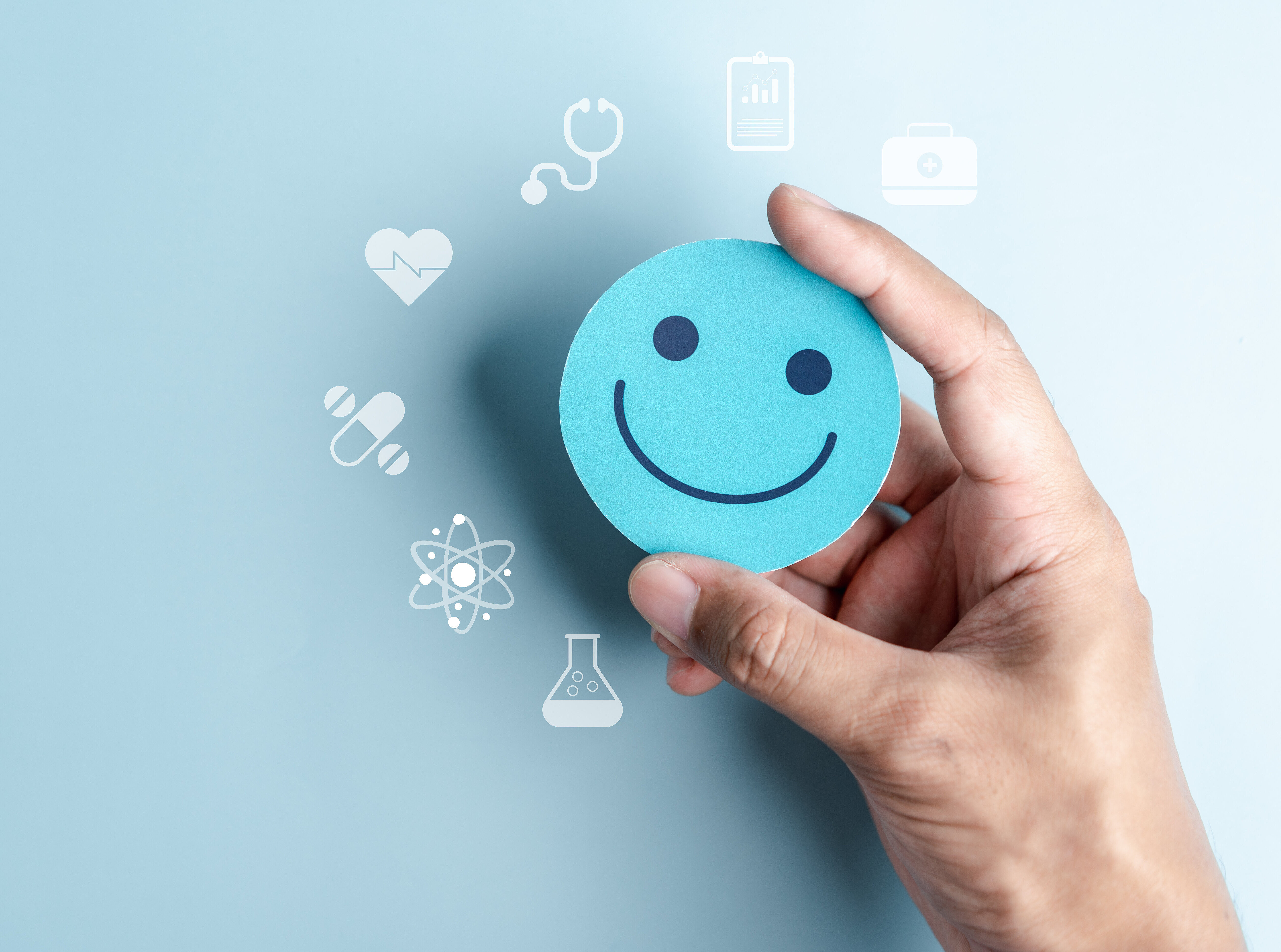 Auf dem Bild ist ein blauer Smiley auf blauem Untergrund zu sehen