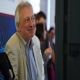 A guest listening to a 6G presentation