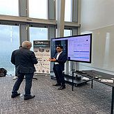 The booth of Olive Robotics at the Summit