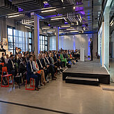 Das Bild zeigt den Vortragssaal des 1. Scale-MX Kongress