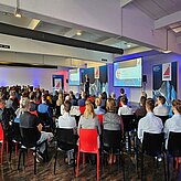 Dr. Markus Wittmann speaking on the stage of the Thinknet 6G Summit