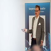 Mr. Sägebrecht presenting on the Thinknet 6G Summit stage