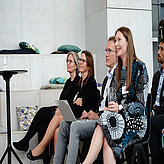 Dr. Lindner and Dr. Parsons watching the presentations